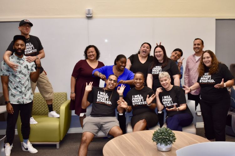 Students from the Organizational Leadership, Criminal Justice concentration posing inside Benerd College.