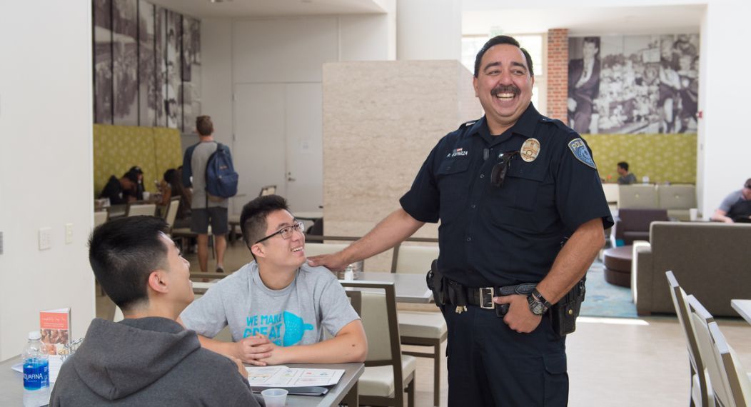 a public safety office talks to students